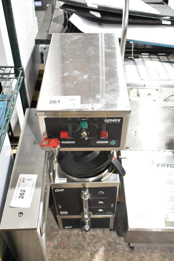 BRAND NEW SCRATCH AND DENT Curtis GEM-120A-10 Gemini coffee brewer, stainless steel, analog, 120 volts, visible label "Caution Hot Water."