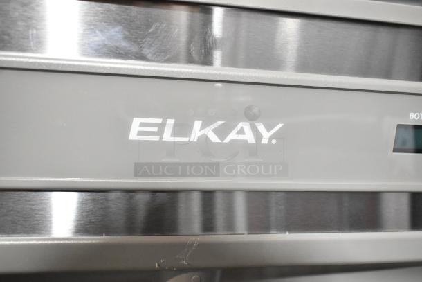 Elkay EZWSR_1D water bottle filler, new with scratches and dents. Visible Elkay logo, ideal for water fountains, 115V, 1 phase.