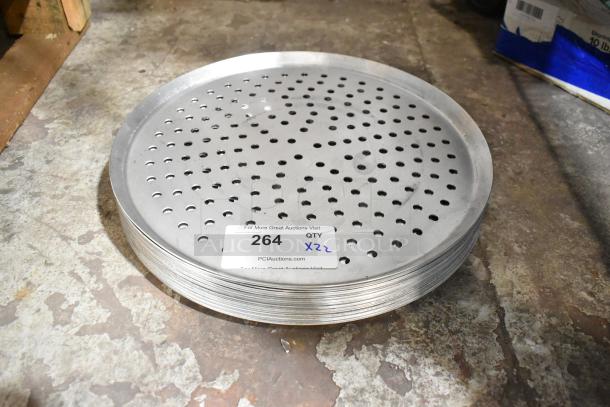 Alt text: Stack of 22 American Metalcraft CAR16P 16" perforated heavy-weight aluminum pizza pans, scratch and dent condition.
