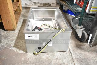 Brand new Avantco 177BM12SA stainless steel hot food well. Features square corners, drain, and 120V. Auction tag visible.