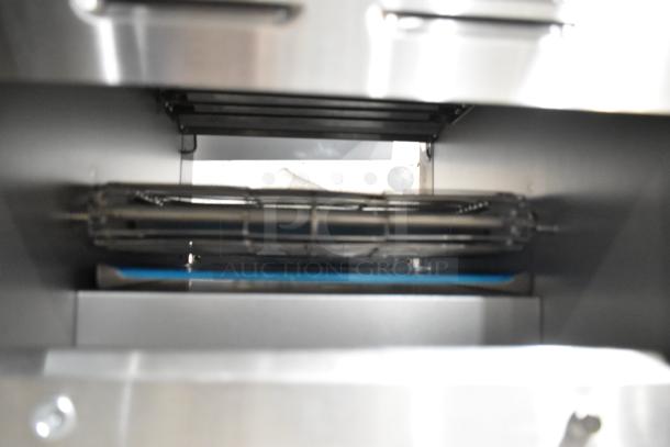 Avantco 184T140 stainless steel conveyor toaster interior view, brand new condition, 10" wide, 3" opening.