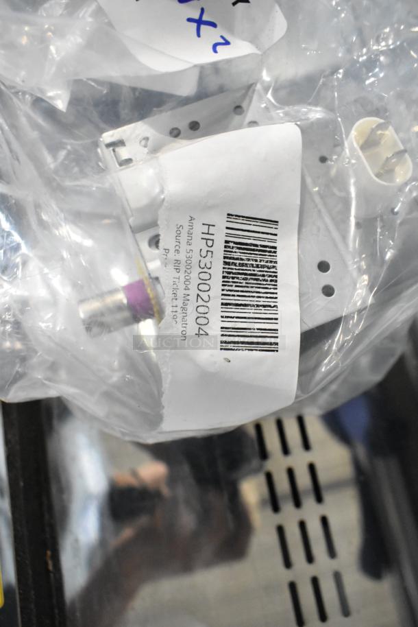 Brand new Amana 53002004 Magnetron HP53002004 in packaging, indicating scratch and dent condition. Barcode visible.