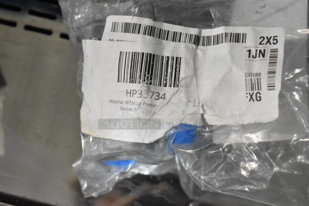 3 new Imperial items: LP Pressure Regulator HP38734, Oven Safety HP11101, Timer HP32209 in packaging. Tags indicate product info.