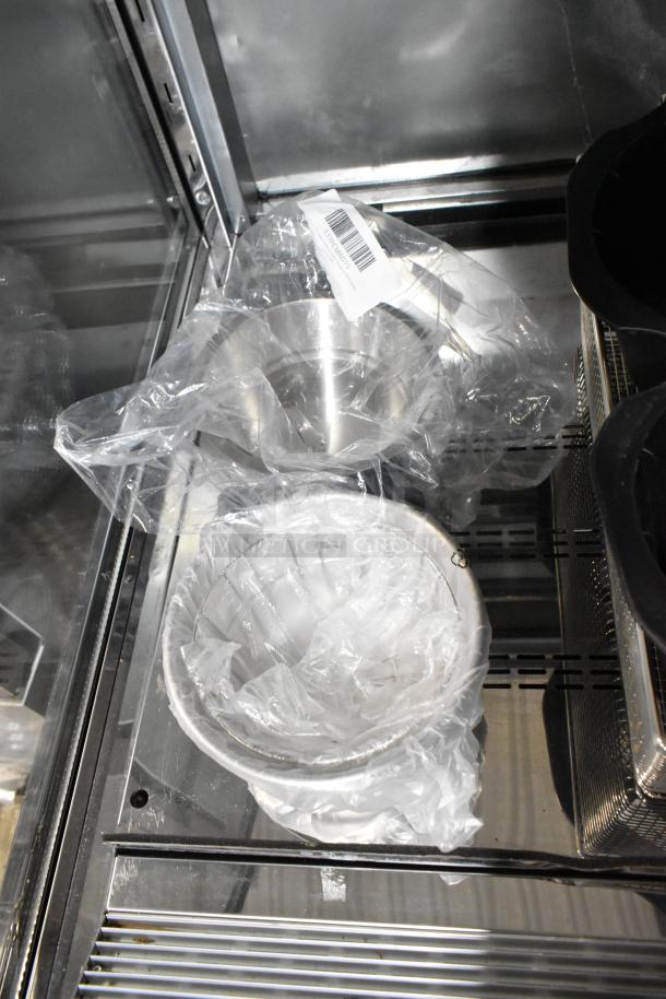 Brand new Avantco 177PCMAD15 and American Range A33001 baskets in protective packaging; visible barcode on plastic wrap.