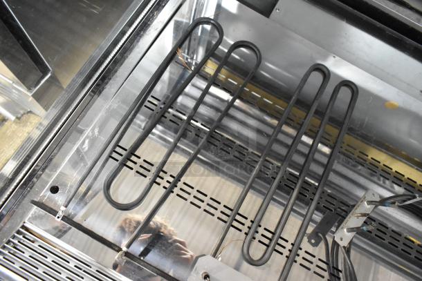Hatco heating elements, including R02.08.581.03 and 02.09.304.00 models, new condition, visible wiring and metal casing.