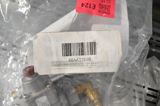 Two brand new items in packaging: American Range A37608 Kit TS11 Safety Valve Assembly and Hatco Motor HWBI Med 120V.