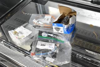 Five brand new items, including Avantco control board, Lincoln temp control, Dearborn sink strainer, Moffat spark electrode, and Hatco element, in original packaging, with minor scratches. Labels detail model numbers and components.