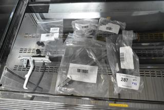 6 brand new scratch and dent items, including Hatco Element and Imperial Fan Switch, each in clear packaging with labels.