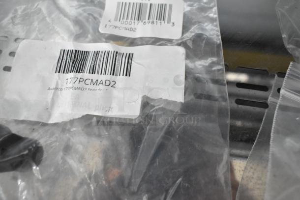 Plastic bag containing Avantco 177PCMAD2 foot, barcode and label visible. Part of a 6-item scratch and dent auction set.