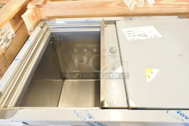 Brand new 2022 H&K 52473-1 stainless steel commercial French fry freezer in crate, with fry basket holder, on casters.