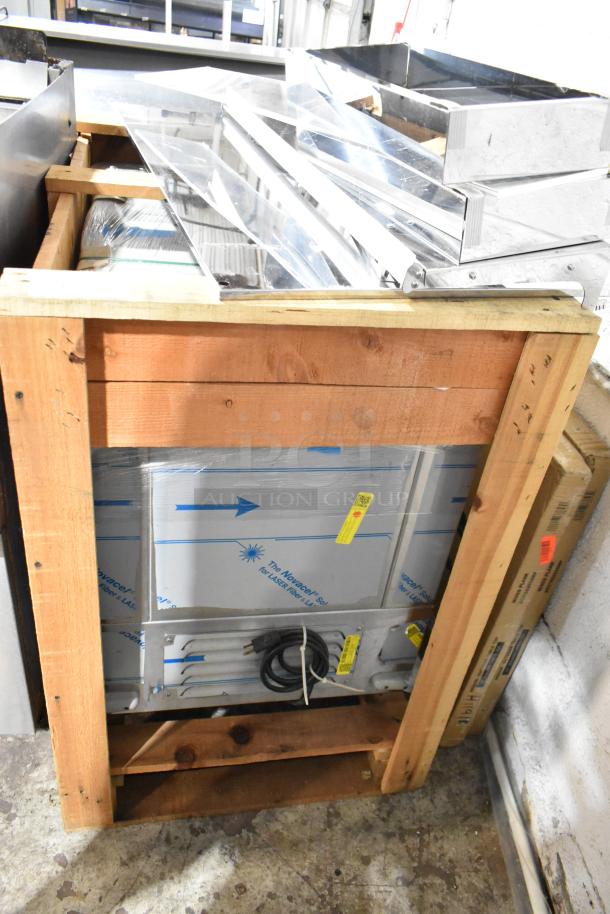 Brand new 2022 H&K 52473-1 stainless steel commercial French fry freezer in crate, with fry basket holder, 115V, 1 phase.