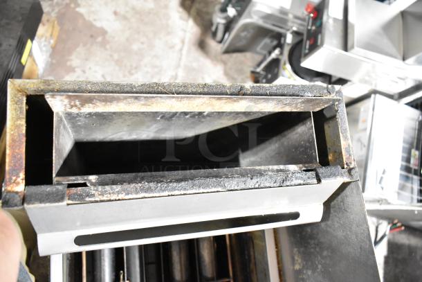 Vulcan 1GR45M-1 stainless steel deep fat fryer on casters, showing interior. Used condition with visible wear.