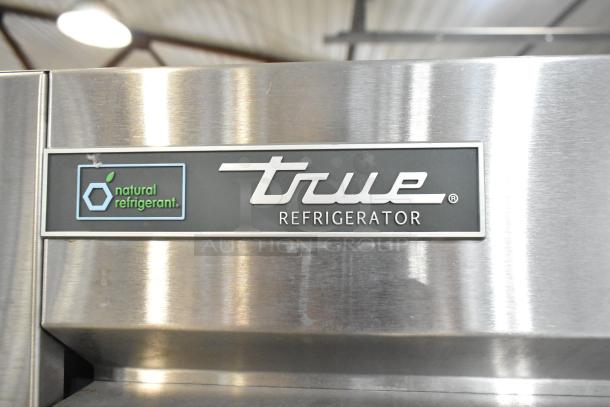True T-35-HC stainless steel commercial 2-door cooler with poly coated racks, natural refrigerant label visible.