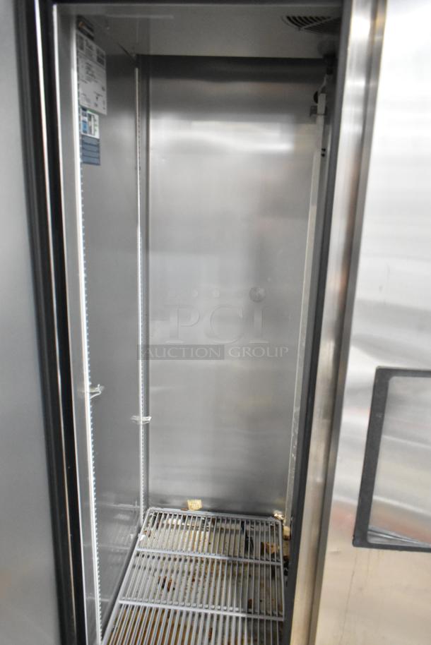 2020 True T-35-HC stainless steel 2-door reach-in cooler, poly coated racks, 115V, 1 phase, clean interior, good condition.