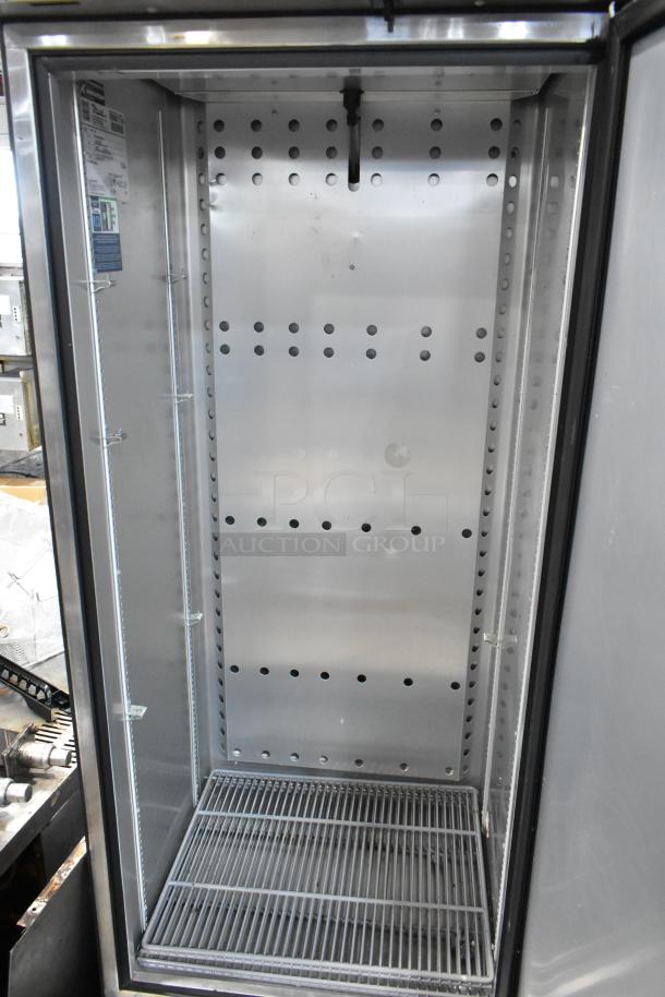 2020 True T-19F-HC stainless steel commercial freezer, single door, poly-coated racks, 115V, 1 phase, excellent condition.