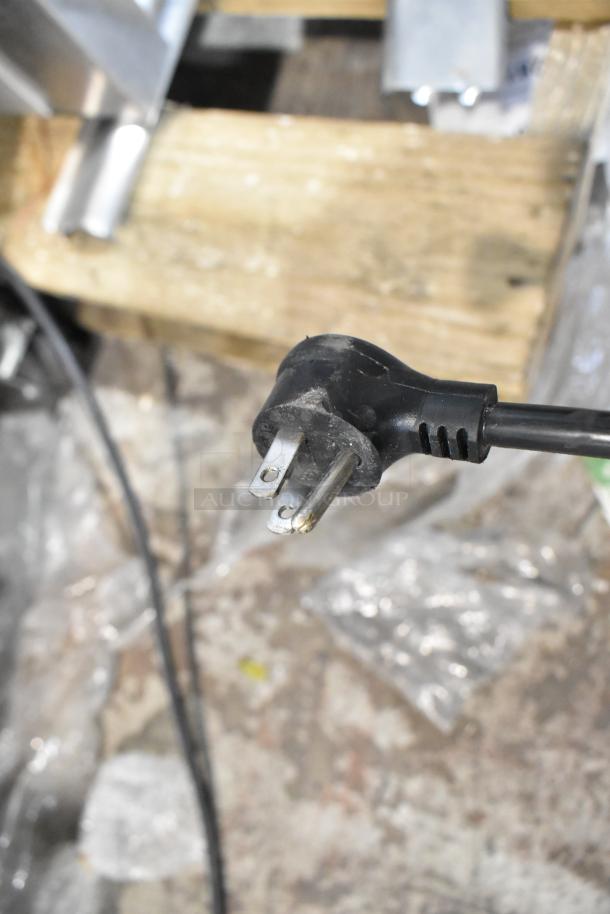 Electrical plug of a 2020 True T-19F-HC commercial freezer, 115 volts, 1 phase, in used condition.