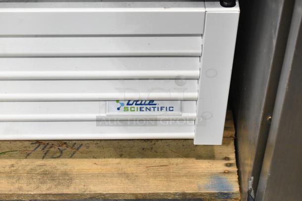 Brand new True TSCI-600R-G-PH cooler on pallet. Features include metal body, single door, and poly-coated racks.