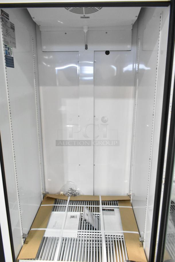 Brand new 2025 True TSCI-600R-G-PH commercial cooler, single glass door, poly-coated racks, 115V, minor scratches.