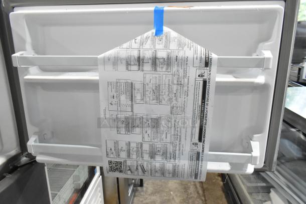 Brand new Whirlpool WRT311FZDM05 stainless steel cooler with freezer, 115 volts, 1 phase, scratch and dent condition.