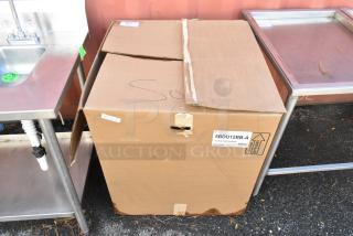 Cardboard box containing Fantech 5BDU12BB-A metal upblast roof fan, labeled, in original packaging, sealed.