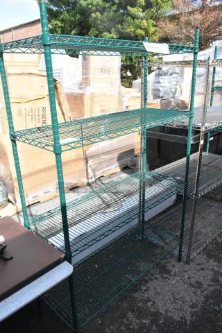Green four-tier wire shelving unit in good condition, suitable for storage. Buyer must dismantle for shipping.