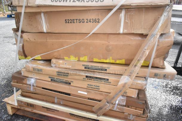 11 boxed items including Regency and Steelton stainless steel work tables, and a Garde cheese blocker. New condition.
