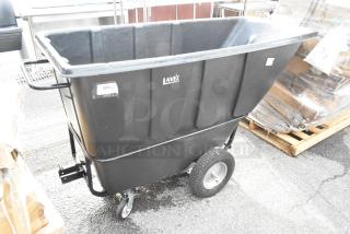 BRAND NEW Lavex black poly tilt truck, scratch and dent condition, with wheels and handle, labeled for industrial use.