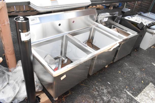 Brand new Regency 600S21818 commercial sink, 74" 16-gauge stainless steel, two compartments, galvanized steel legs, two 18"x18"x14" bowls, with drainboards. Scratch and dent condition.