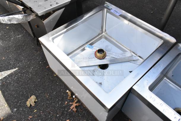 Brand new Regency 29" stainless steel mop sink, 16-gauge, 24"x24"x12" bowl, with minor scratches and dents.