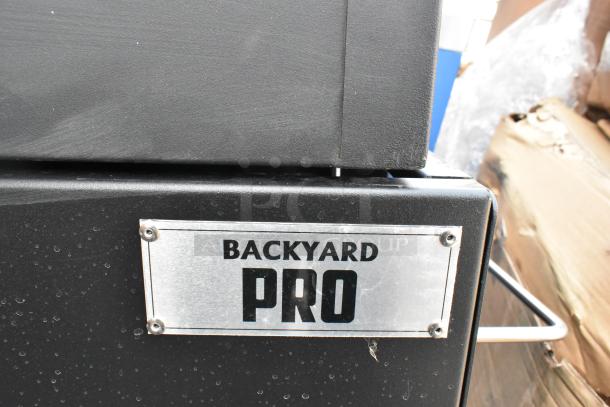 BRAND NEW Backyard Pro 554SMOKR60AS 60" charcoal/wood smoker grill, adjustable grates, minor scratches/dents, assembled.