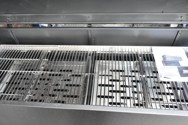 BRAND NEW Backyard Pro 60" charcoal/wood smoker grill, with adjustable grates and dome, scratch and dent condition.