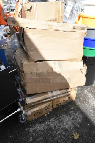 Damaged boxes containing brand new Choice 109CARTBUSBK black utility carts and outdoor bar height steel column.