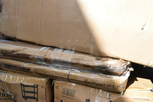 Brand new, scratch and dent lot with two Choice 109CARTBUSBK black utility carts, three shelves, 32"x16", sealed packaging.