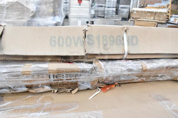Pallet of brand new Regency and Steelton stainless steel tables, boxed and wrapped. Boxes show minor wear, labeled with model info.
