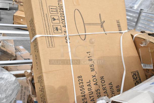 Pallet lot with a boxed Regency 18" x 60" stainless steel work table, scratch and dent condition, galvanized legs, and undershelf.