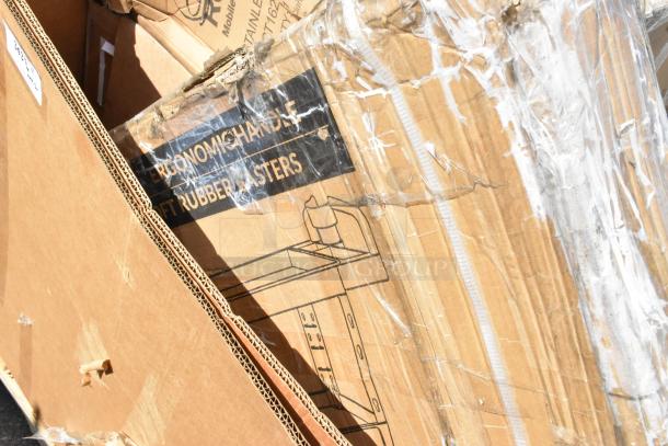 Cardboard boxes labeled with ergonomic handle and rubber casters containing brand new utility carts, partially taped.