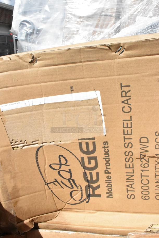 Cardboard box labeled "Regency Mobile Products, Stainless Steel Cart, 600CT1627WD," showing signs of minor damage.