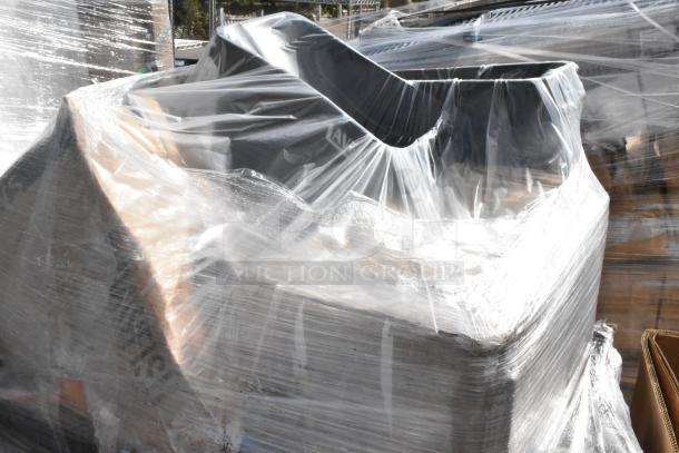 A lot of various items wrapped in plastic, featuring a Lavex 23-gallon black slim rectangular trash can, brand new with possible scratches and dents.