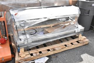 Brand new Alto Shaam metal commercial heated merchandiser, scratch and dent condition, wrapped on a pallet.