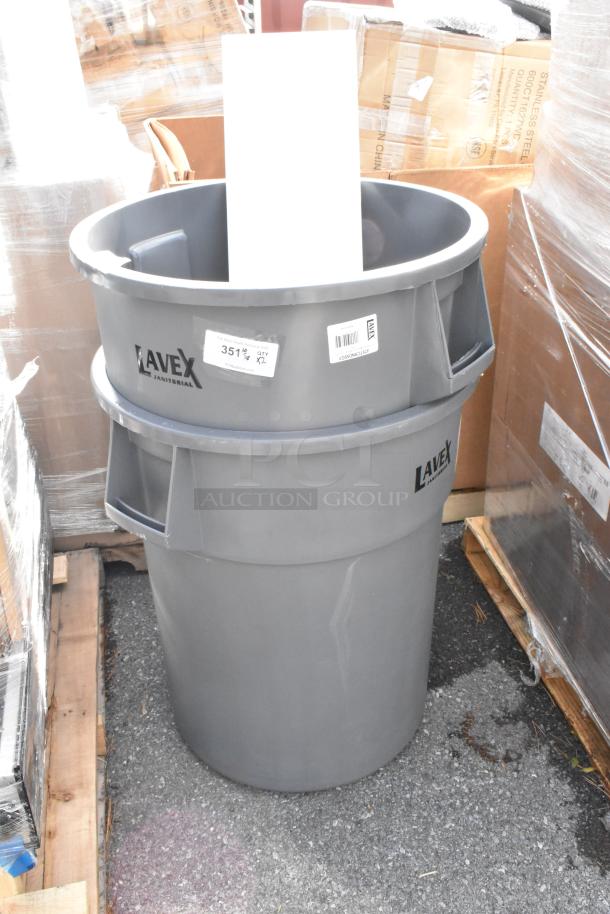 2 new Lavex 475TCRND55GY 55-gallon gray round commercial trash cans. Some scratches/dents. Labels visible.