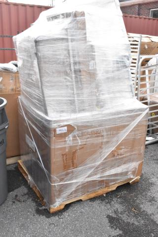 Wrapped pallet of various scratch and dent items in boxes, labeled as brand new, on a wooden pallet. Visible wear on packaging.