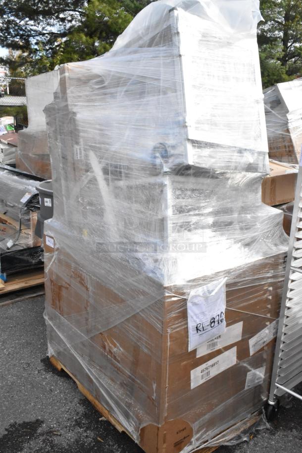 Pallet of various items wrapped in plastic, labeled “BRAND NEW SCRATCH AND DENT,” showing some packaging wear.