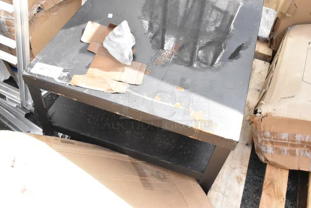 Brand new scratch and dent metal stand, black, minor rust and dents visible, sturdy construction. Tags showing "35-48-29".