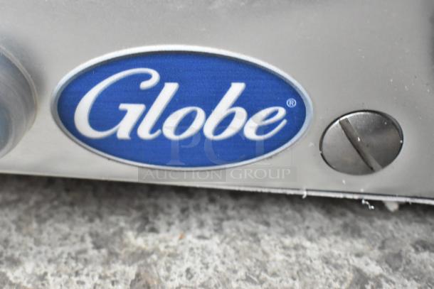 Globe G10 metal countertop meat slicer with blade sharpener, featuring 115 volts, 1 phase, logo visible.