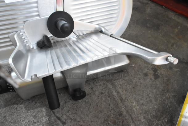 Globe G10 metal commercial countertop meat slicer with blade sharpener, 115 volts, 1 phase, features sturdy construction.
