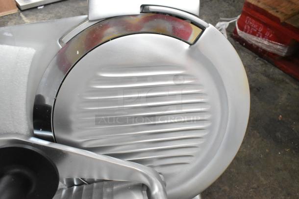 Globe G10 metal commercial countertop meat slicer with blade sharpener, 115 volts, 1 phase, visible rotary blade and sturdy build.