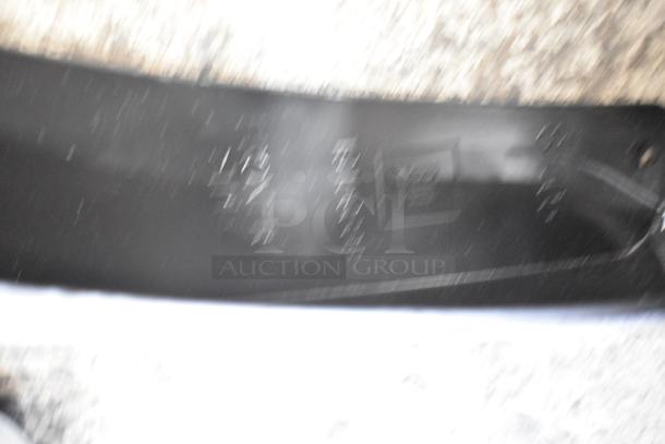 Box of parts in two black poly bins, appears minimally used; markings indicate potential manufacturer or part number.