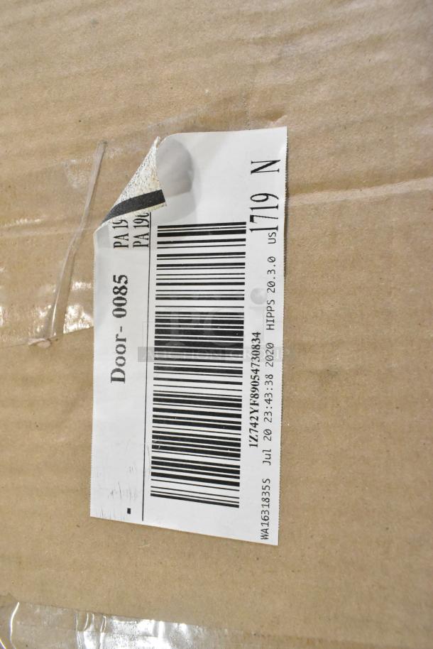 Cardboard box with label showing barcode and text "Door-0085" and other product codes, part of auction lot with 3 items including 2 pull-down screens.