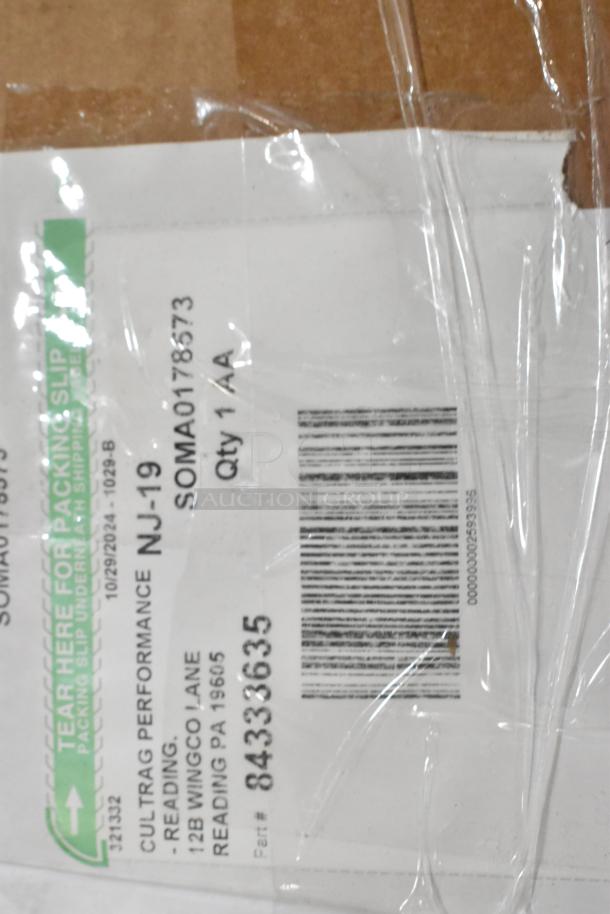 Cardboard box with shipping label showing tracking details and "CULTRAG PERFORMANCE, NJ-19, SOMA0178573, Qty 1 AA."