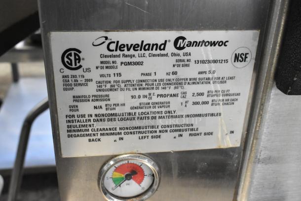 Cleveland PGM3002 stainless steel pressure steam cabinet label, showing model, serial number, specs, and certification marks.